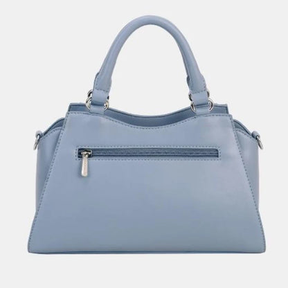 Rear view of powder blue leather handbag showing exterior zip pocket