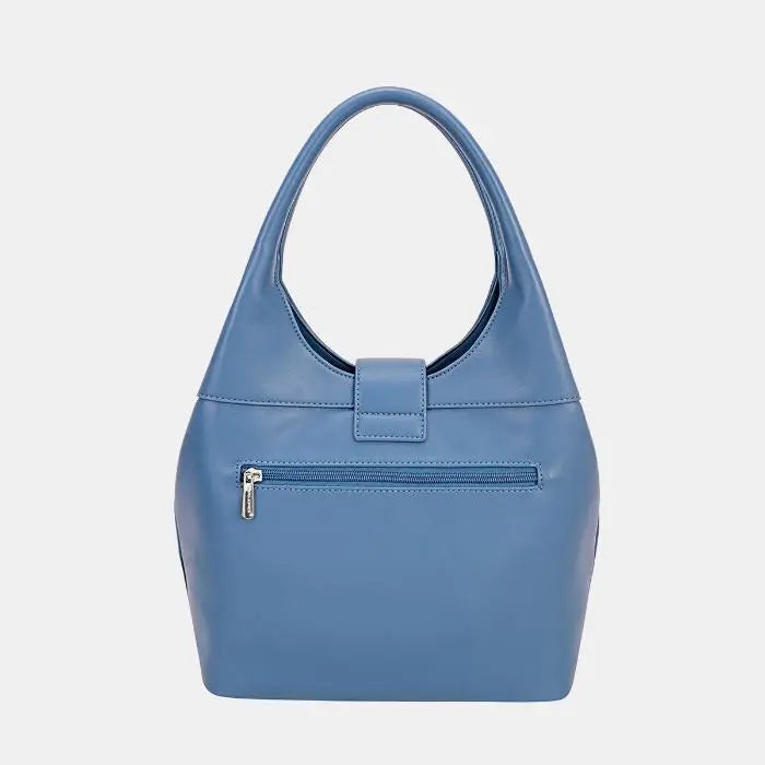 Sleek blue leather handbag with curved top handle, zippered back pocket, and smooth surface. Perfect for modern professionals.