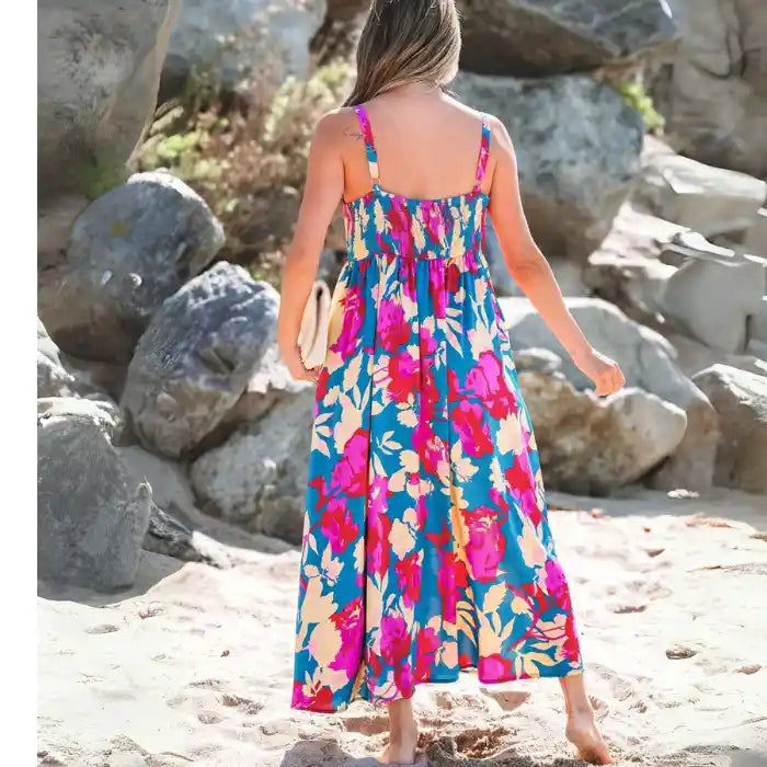 Blue pink floral maxi dress back view showing smocked bodice and flowy silhouette.