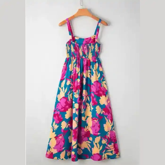 Blue pink floral maxi dress fabric detail highlighting vibrant print and smooth texture.