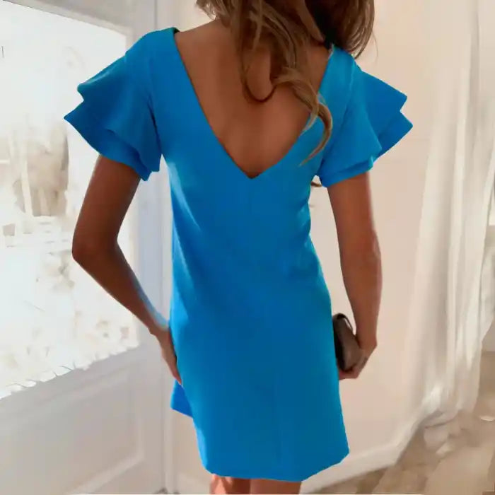 Blue ruffle sleeve shift dress back view with a deep v-cut and soft flowy silhouette