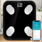 Bluetooth body fat scale with smartphone app displaying body metrics including BMI, body fat, muscle weight and full health report