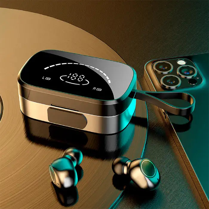 Bluetooth Earbuds with metallic charging case and digital LED display next to smartphone on gold surface.