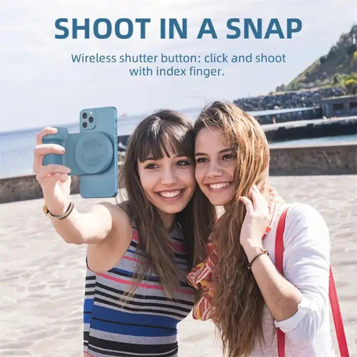 Multifunctional phone grip/stand with magnetic camera handle used for selfie by two women outdoors