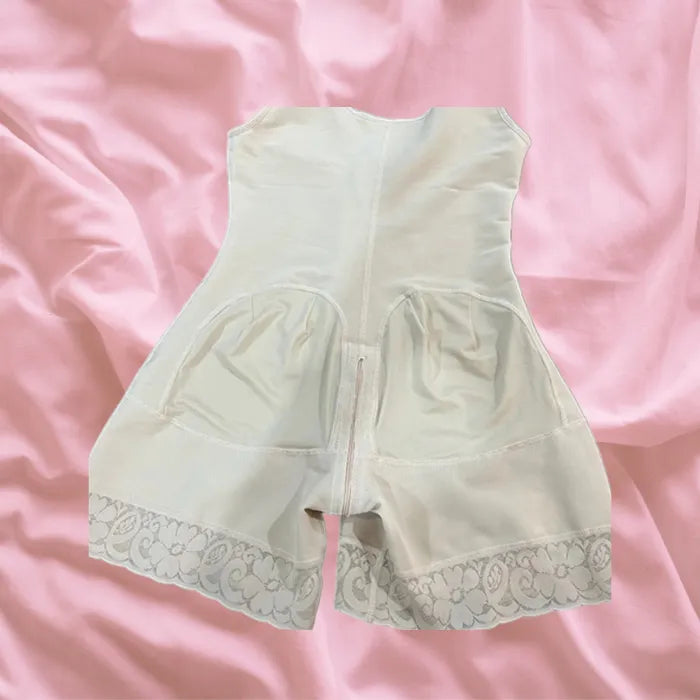 Body Shaper for Tummy Control featuring inner lining and lace hem details in beige on pink satin background.
