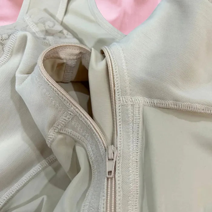 Body Shaper for Tummy Control with close-up of zip closure and reinforced seam stitching for compression fit.