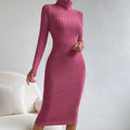 Bodycon dress in pink ribbed knit fabric with turtleneck design and long sleeves, form-fitting midi length style against neutral background