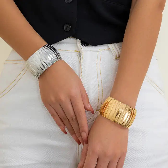 bracelet fashionable gold and silver wide bangles styled on wrists