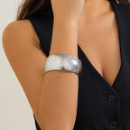 bracelet fashionable hammered silver wide bangle styled on arm