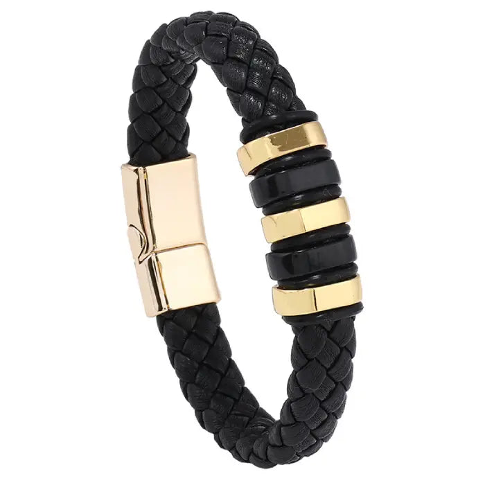 Black braided leather bracelet with gold accents and magnetic clasp, ideal for elegant men’s fashion.