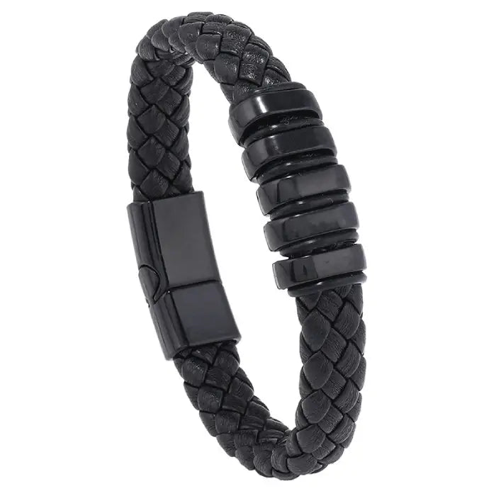 Black braided leather bracelet with matte black accents and clasp for a sleek men’s wrist accessory.