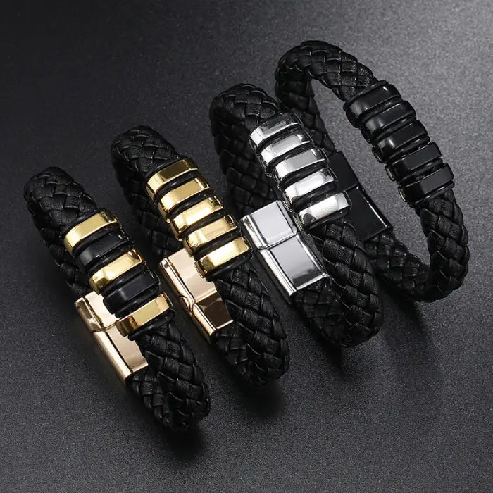 Set of braided leather bracelets with gold and silver magnetic clasps for men’s fashion accessories.