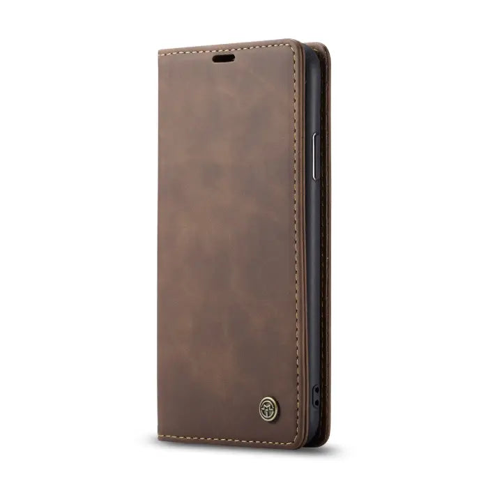 Durable brown leather wallet phone case with magnetic closure and stylish craftsmanship for devices.