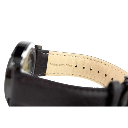 authentic Tommy Hilfiger watch band showing branded leather strap with adjustment holes and genuine leather construction