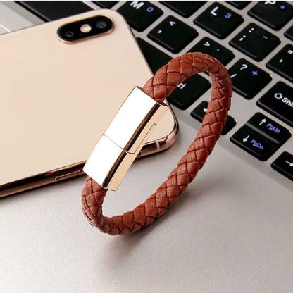 Elegant brown leather USB charging and data sync bracelet with a stylish design for portable use.