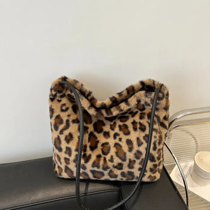 Brown leopard print faux fur shoulder bag with a sleek design, perfect for casual chic outfits.