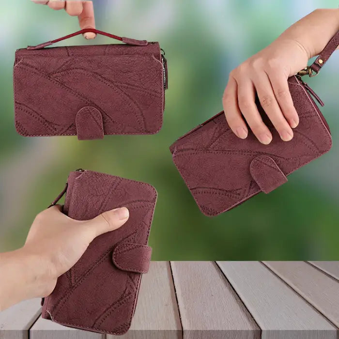 Magnetic wallet phone case in burgundy leather featuring textured exterior, snap closure and wristlet functionality