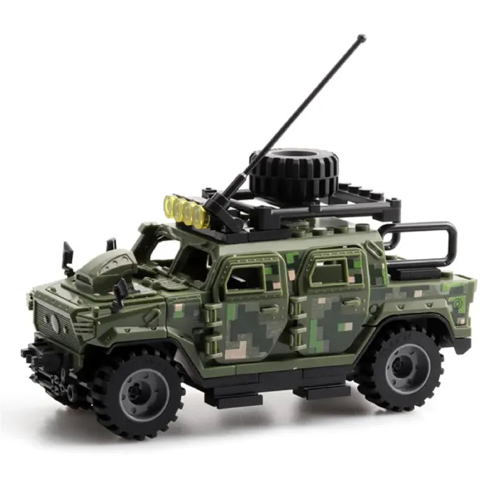 Close-up of a green camouflage armored military toy vehicle featuring a roof rack and antennas.