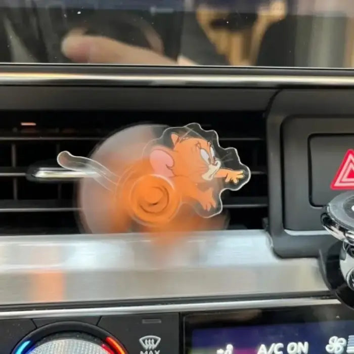 Car Air Freshener jerry mouse character spinning on car dashboard vent