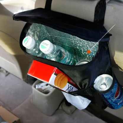 Black car seat organizer with cooler compartment containing water bottles, snacks, and other items hanging on car headrest