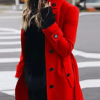 .Cardigan Large Coat in bold red, styled with black base outfit, ideal for standout winter street fashion.