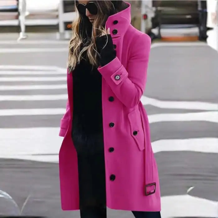 .Cardigan Large Coat in hot pink, styled outdoors with black outfit and sunglasses for bold winter wear.