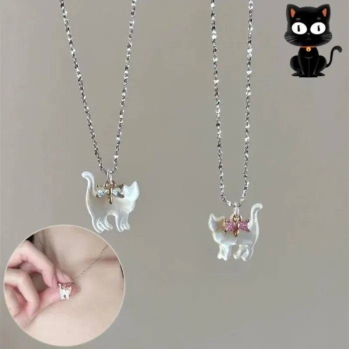 Cat Pendant Necklace with iridescent cat charm and blue crystal bow on silver chain