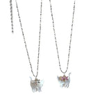 Cat Pendant Necklace with iridescent cat charm and delicate blue gemstone bow