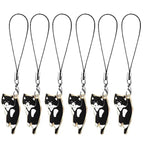 cat phone charm set featuring black tuxedo cat designs hanging on black straps