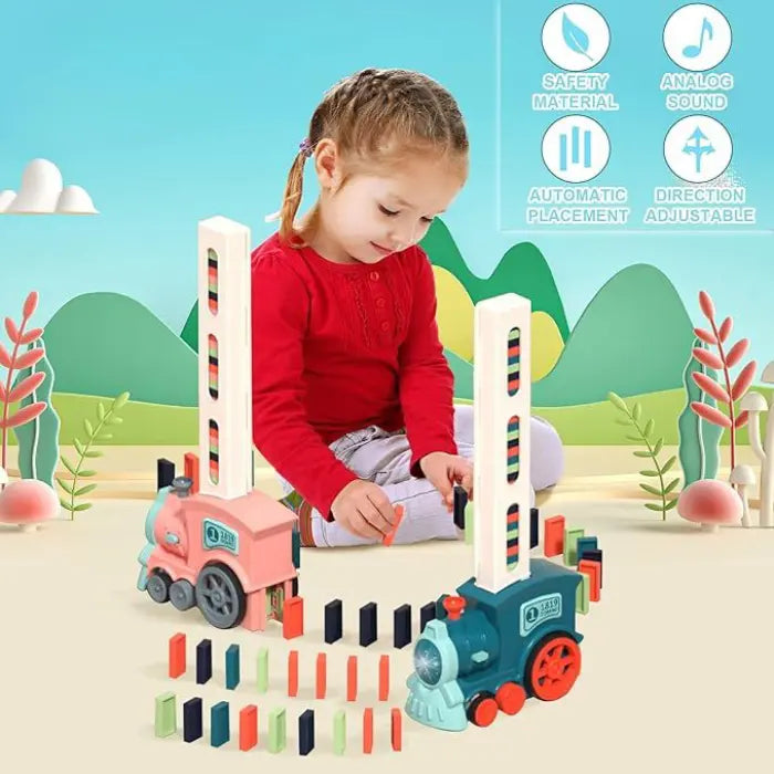 Young girl playing with a domino train set featuring automatic placement and colorful dominoes.