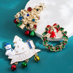 Christmas brooch set featuring wreath, tree, and snowman with festive gift and jingle bell accents