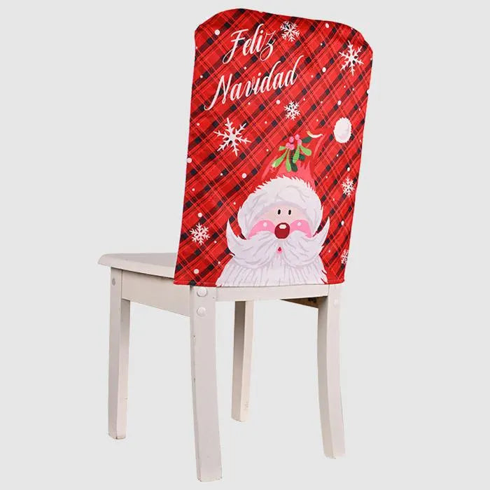 Red plaid Christmas chair cover with whimsical Santa face design and "Feliz Navidad" text, decorated with snowflake patterns