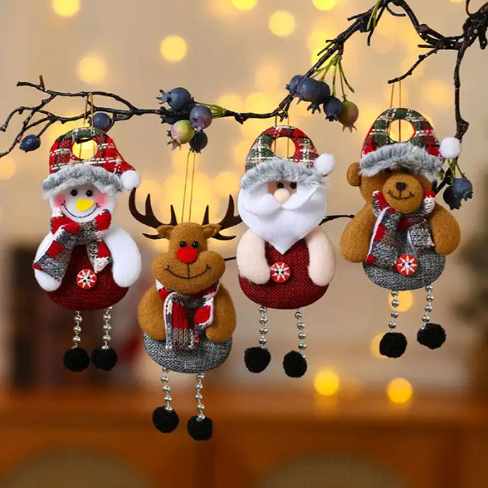 christmas decorations elderly plush snowman reindeer santa and bear ornaments hanging on branch with warm lights