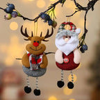 christmas decorations elderly reindeer and santa plush ornaments hanging on branch with festive bokeh lights