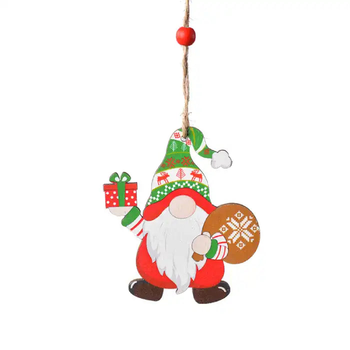 christmas decorations painted gnome ornament with green hat holding a red gift and round cookie with snowflake design