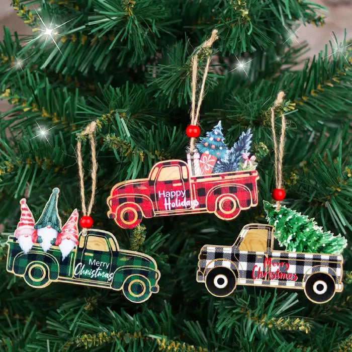 Christmas Decorations plaid truck ornaments with trees and gnomes hanging on a Christmas tree.