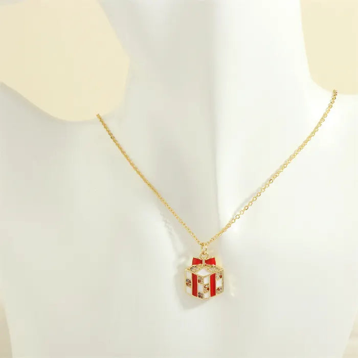 christmas jewelry gold necklace with red and white gift box charm