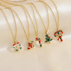 christmas jewelry collection of gold necklaces with wreath stocking candy cane tree and heart charms