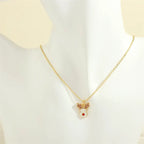 christmas jewelry gold necklace with white reindeer face and red nose charm
