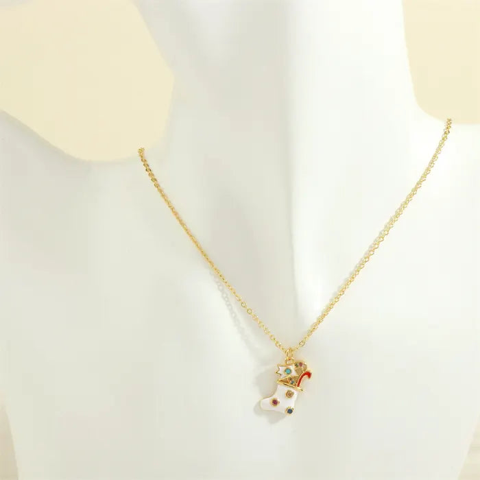 christmas jewelry gold necklace with white enamel stocking charm