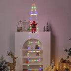 Christmas ladder lights with Santa climbing white shelf in cozy indoor holiday setup.