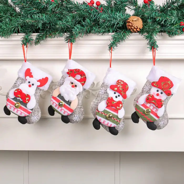 Christmas stockings hanging on fireplace with Santa, reindeer, snowman, and bear designs in red and white.
