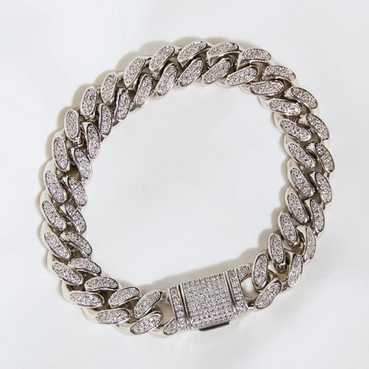 Elegant silver diamond-encrusted Cuban link bracelet with secure clasp featuring premium pave setting and high-end finish