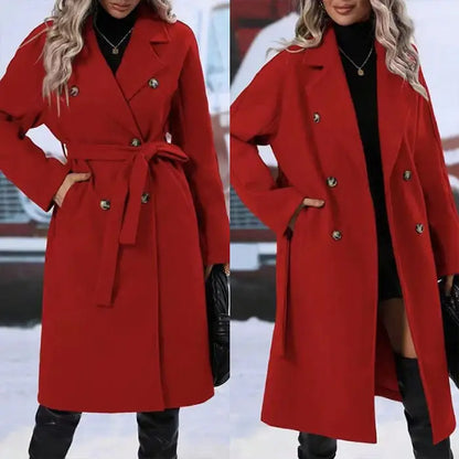 Vibrant red wool coat with double-breasted buttons and belt tie, styled with black turtleneck and leather boots in snowy setting