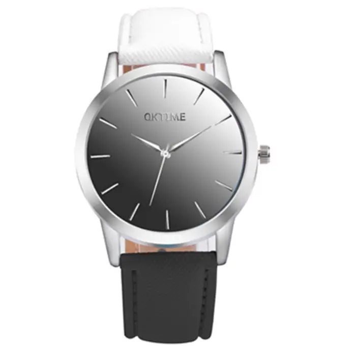 Minimalist women's watch with black gradient dial, silver case, and black leather band