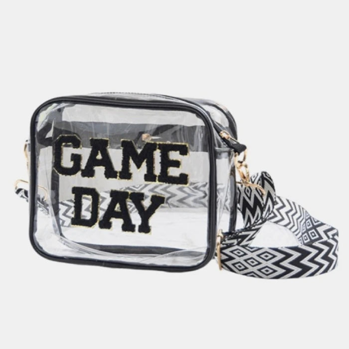 Transparent stadium-approved crossbody bag with black "GAME DAY" text and chevron strap for sporting events and concerts