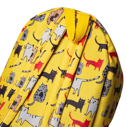 Close-up of a yellow backpack with a detailed colorful cat pattern and sturdy handle.