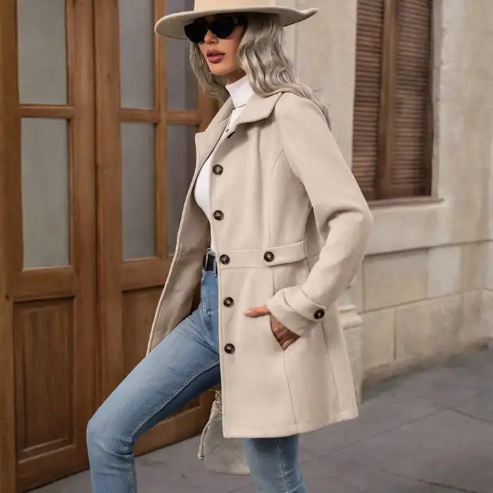 Coat Buttons beige longline coat with buttons and side pockets.