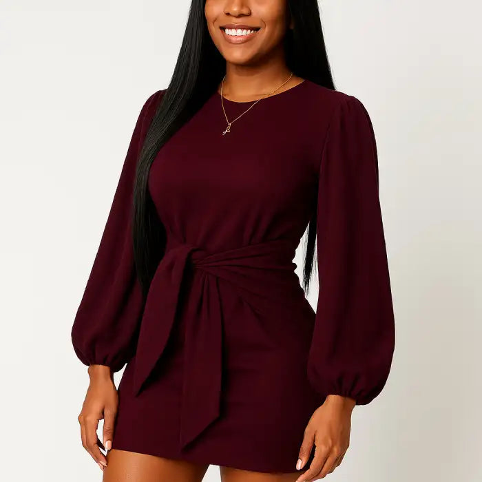 Cocktail dress in ruched red bodycon style, featuring a flattering fitted silhouette for formal occasions.