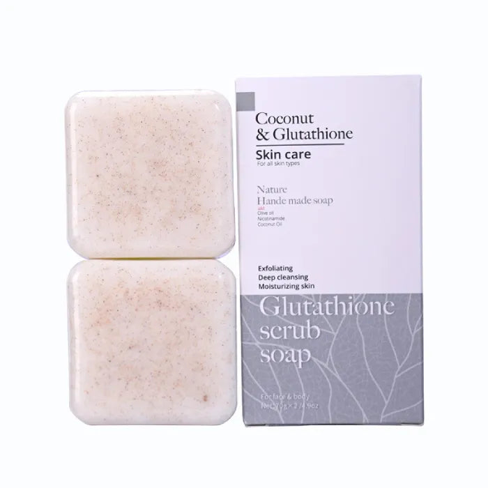 Coconut and glutathione scrub soap bars in minimal white packaging.